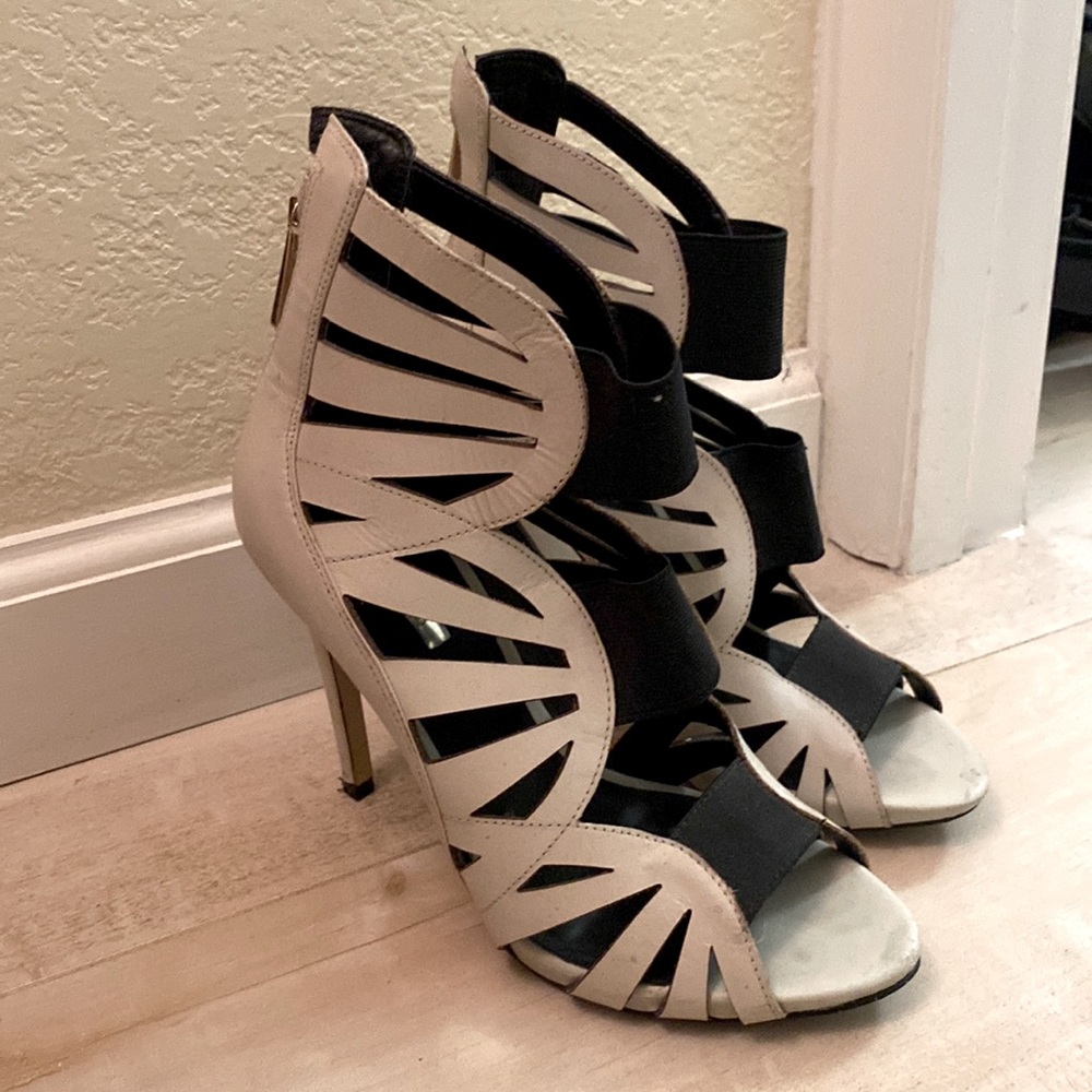 Guess high heeled open toed bootie style shoes